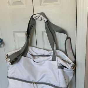 White and Gray Duffle Travel Bag